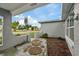 Inviting front porch with a stone pathway and landscaping at 1332 Maybury Dr, Holiday, FL 34691