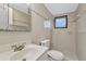 Clean bathroom with tile, a toilet, sink, and shower at 1332 Maybury Dr, Holiday, FL 34691