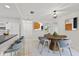 Dining area with a round table and chairs near kitchen at 1332 Maybury Dr, Holiday, FL 34691