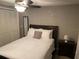 Inviting bedroom with a sleigh bed and plenty of space at 6115 7Th Ave, New Port Richey, FL 34653