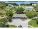 Beautiful home with a large yard, close to a lake, with gorgeous landscaping at 1215 Bayshore Dr, Terra Ceia, FL 34250