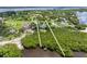Waterfront homes in neighborhood with scenic views and boat docks at 1215 Bayshore Dr, Terra Ceia, FL 34250