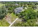 Aerial view showcasing home and surrounding landscape at 1215 Bayshore Dr, Terra Ceia, FL 34250
