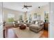 Relaxing Gathering room featuring a large sectional sofa and built-in shelving at 1215 Bayshore Dr, Terra Ceia, FL 34250