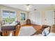 Home office with hardwood floors and built in bookcases at 1215 Bayshore Dr, Terra Ceia, FL 34250