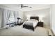 Cozy bedroom with a treadmill and other exercise equipment at 5707 Butterfield St, Riverview, FL 33578