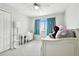 Charming bedroom featuring a built-in desk and window seating at 5707 Butterfield St, Riverview, FL 33578