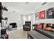 Open loft area featuring comfortable seating and a game area at 5707 Butterfield St, Riverview, FL 33578