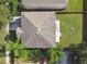 An aerial shot of a house featuring a backyard, patio and pool at 5707 Butterfield St, Riverview, FL 33578