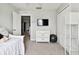 Bright bedroom with double doors and plenty of closet space at 5707 Butterfield St, Riverview, FL 33578