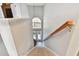 View of staircase leading to the main level at 5707 Butterfield St, Riverview, FL 33578