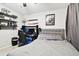 Bedroom with a bed, desk, and shelves at 5707 Butterfield St, Riverview, FL 33578