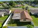Aerial view of a single Gathering home in a residential neighborhood at 7702 Ivory Ter, New Port Richey, FL 34655