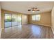 Bright living room with sliding glass doors leading to a patio at 7702 Ivory Ter, New Port Richey, FL 34655