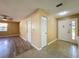 Bright and airy entryway with tile flooring and access to living areas at 7702 Ivory Ter, New Port Richey, FL 34655