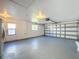 Attached garage with ample space for storage and vehicles at 7702 Ivory Ter, New Port Richey, FL 34655