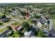 Aerial view of a single Gathering home in a residential neighborhood at 7702 Ivory Ter, New Port Richey, FL 34655
