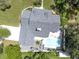 Bird's-eye view of the house, highlighting the pool and backyard at 1810 S Valrico Rd, Valrico, FL 33596