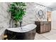 Elegant bathroom featuring a freestanding tub and a stylish vanity at 1810 S Valrico Rd, Valrico, FL 33596