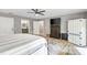 Spacious bedroom with a king-size bed and TV at 1810 S Valrico Rd, Valrico, FL 33596