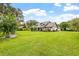 Large home with spacious green yard at 1810 S Valrico Rd, Valrico, FL 33596