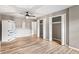 Spacious bedroom with wood-look floors and ample closet space at 1810 S Valrico Rd, Valrico, FL 33596