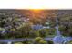 Stunning aerial view of home at sunset at 1810 S Valrico Rd, Valrico, FL 33596