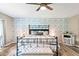 Main bedroom with king bed and built-in storage at 1810 S Valrico Rd, Valrico, FL 33596