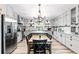 Bright kitchen featuring an island and stainless steel appliances at 1810 S Valrico Rd, Valrico, FL 33596