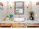 Stylish powder room with granite countertop and vessel sink at 1810 S Valrico Rd, Valrico, FL 33596