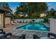 Inviting pool area with spacious patio and lounge chairs at 1810 S Valrico Rd, Valrico, FL 33596
