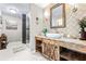 Modern bathroom with rustic vanity and patterned tile at 1810 S Valrico Rd, Valrico, FL 33596