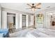 Charming bedroom with built-in shelving and spacious closets at 1810 S Valrico Rd, Valrico, FL 33596