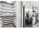 Spacious pantry with ample shelving for food storage at 1810 S Valrico Rd, Valrico, FL 33596