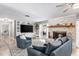 Relaxing living room with built-in shelving and a fireplace at 1810 S Valrico Rd, Valrico, FL 33596
