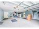 Spacious garage with ample storage shelving and flooring at 1810 S Valrico Rd, Valrico, FL 33596