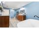 Spa-like bathroom with soaking tub, herringbone tile, and dual vanities at 1810 S Valrico Rd, Valrico, FL 33596