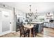Open concept kitchen with a farmhouse-style table at 1810 S Valrico Rd, Valrico, FL 33596