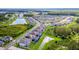 Community overview showcasing multiple homes with pools and conservation areas at 10813 Rolling Moss Rd, Tampa, FL 33647