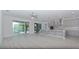 Modern kitchen with gray cabinets and island at 10813 Rolling Moss Rd, Tampa, FL 33647