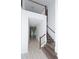 Two-story entryway with a staircase and view of the backyard at 10813 Rolling Moss Rd, Tampa, FL 33647