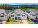 Luxury home with solar panels and a landscaped yard at 10813 Rolling Moss Rd, Tampa, FL 33647