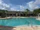 Sparkling community pool with expansive sundeck at 10813 Rolling Moss Rd, Tampa, FL 33647
