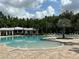 Large community pool with a separate kiddie pool at 10813 Rolling Moss Rd, Tampa, FL 33647