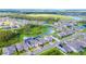 Community overview showcasing multiple homes with pools and conservation areas at 10813 Rolling Moss Rd, Tampa, FL 33647