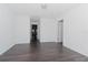 Bright bedroom with hardwood floors and neutral walls at 10813 Rolling Moss Rd, Tampa, FL 33647