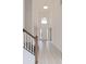 Two-story foyer with wood staircase and tile flooring at 10813 Rolling Moss Rd, Tampa, FL 33647