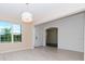 Dining room features a large window and an open concept design at 10813 Rolling Moss Rd, Tampa, FL 33647