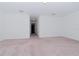 Spacious bedroom with carpeted floors and neutral walls at 10813 Rolling Moss Rd, Tampa, FL 33647