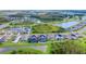 Community overview showcasing multiple homes with pools at 10813 Rolling Moss Rd, Tampa, FL 33647